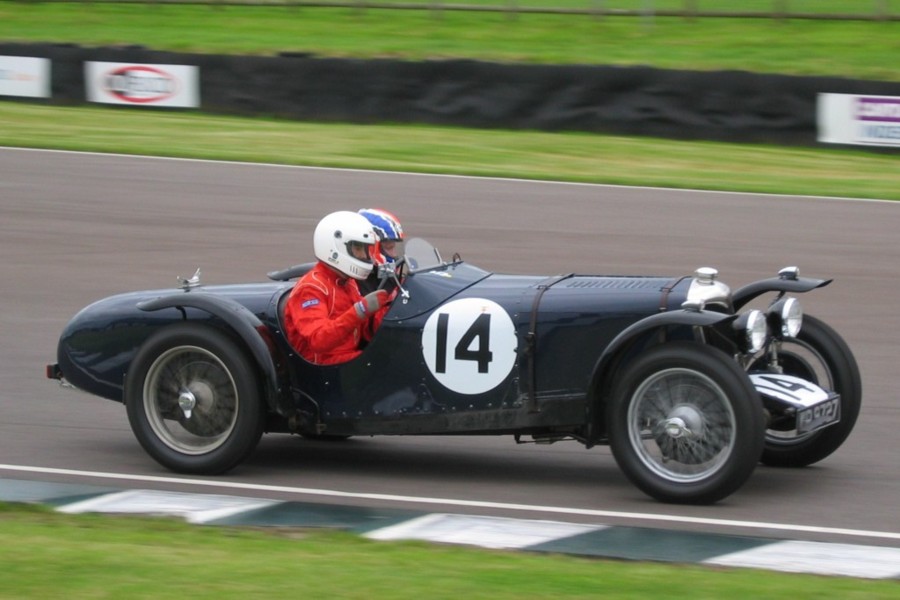 Rob Blakemore drives his Riley 12/4 at Goodwood with Steve Gordon in the passenger seat